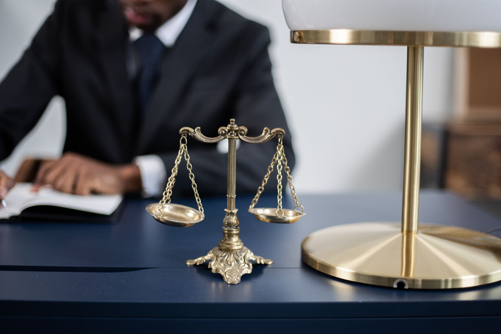 Scales of justice on a solicitor's desk
